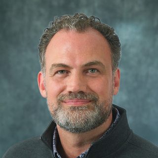 Headshot of Bill Dall, CTO and co-founder of Edwyyn